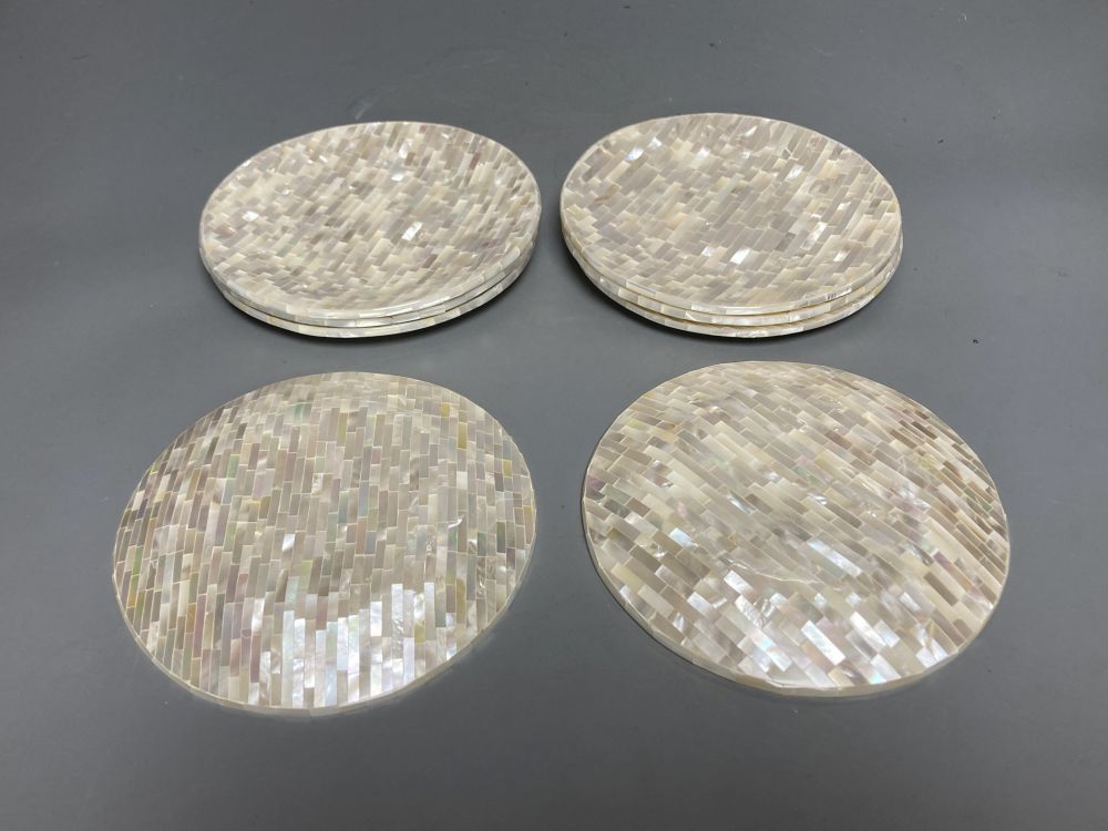 A set of eight mother of pearl dishes, composed of numerous rectangular sections, 13.5cm